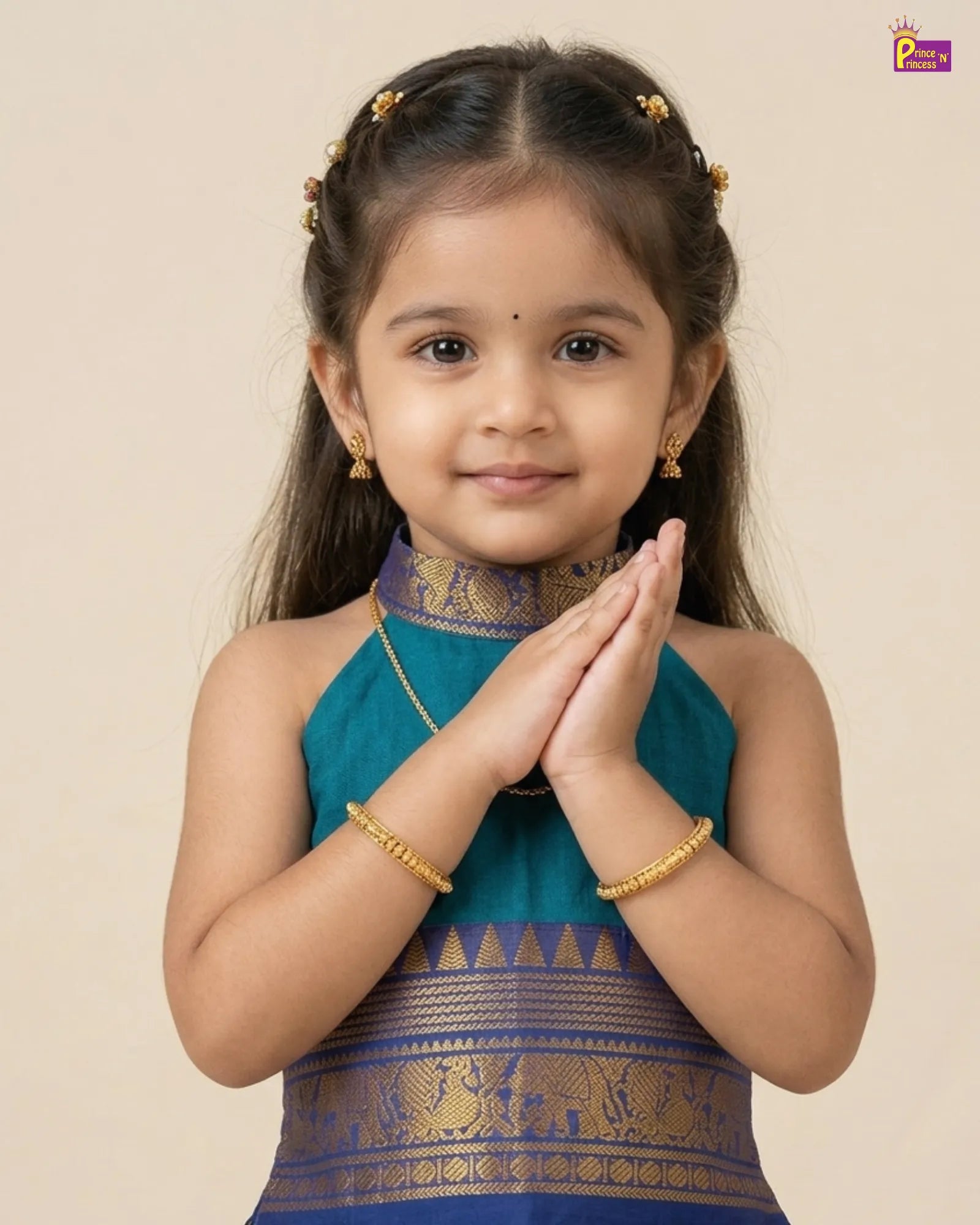 Young girl in traditional attire with gold jewelry against a beige background