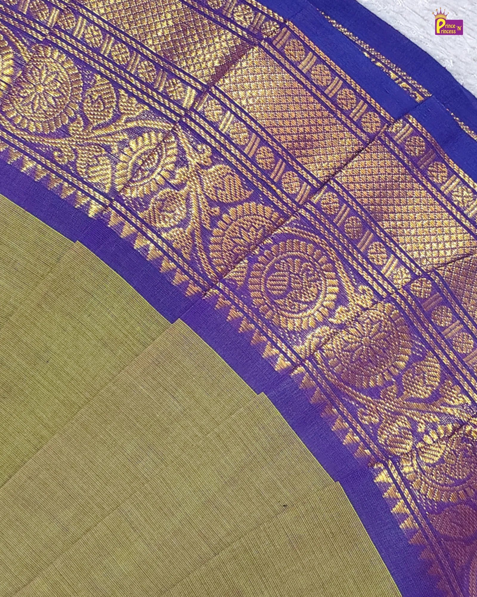 Saree with purple border and gold patterns on a white background