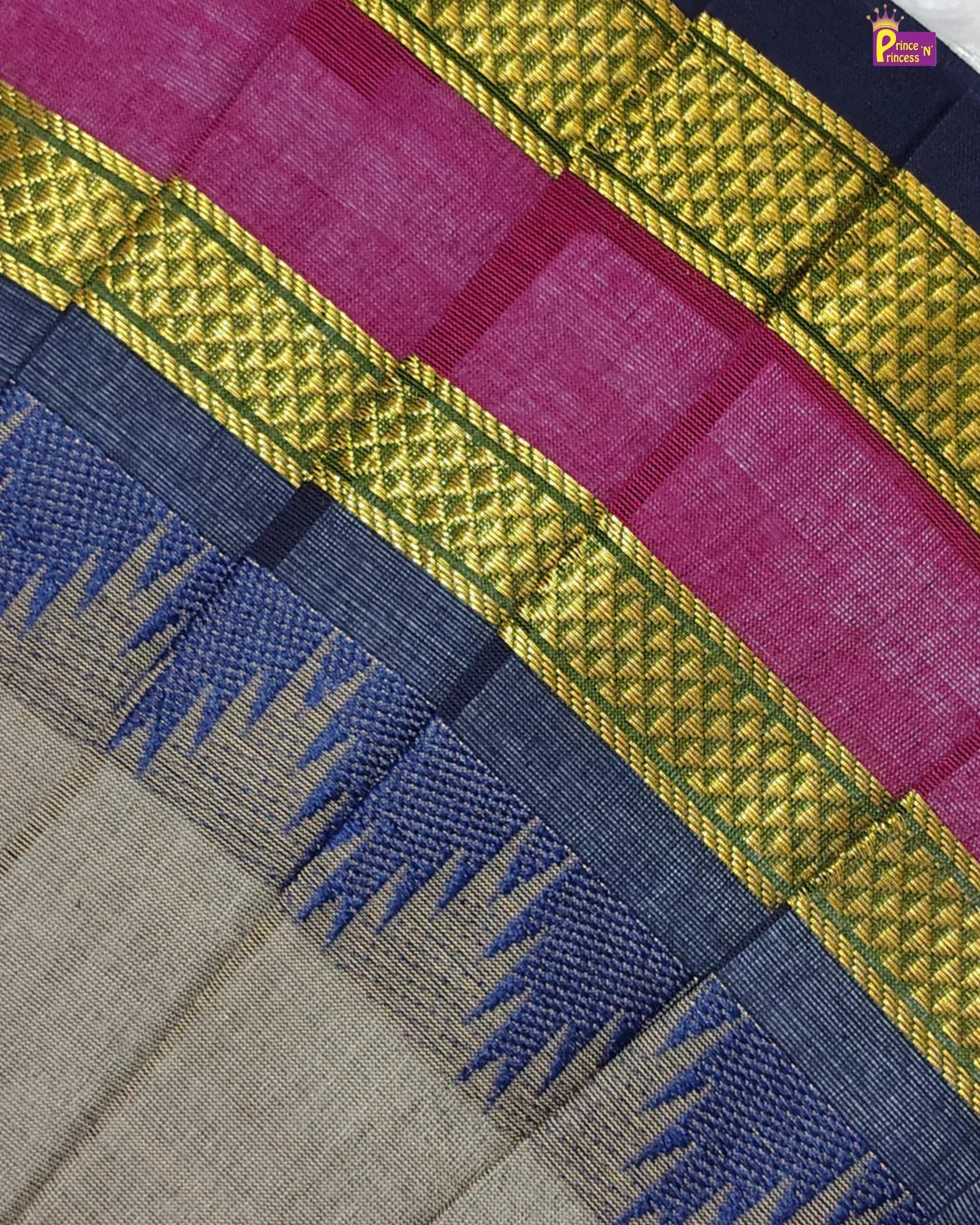 Close-up of a woven fabric with blue, green, and pink patterns.