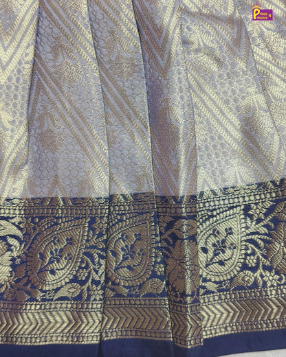 Patterned fabric with blue and gold design