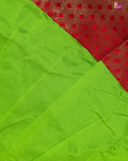 Green fabric with a red mesh pattern