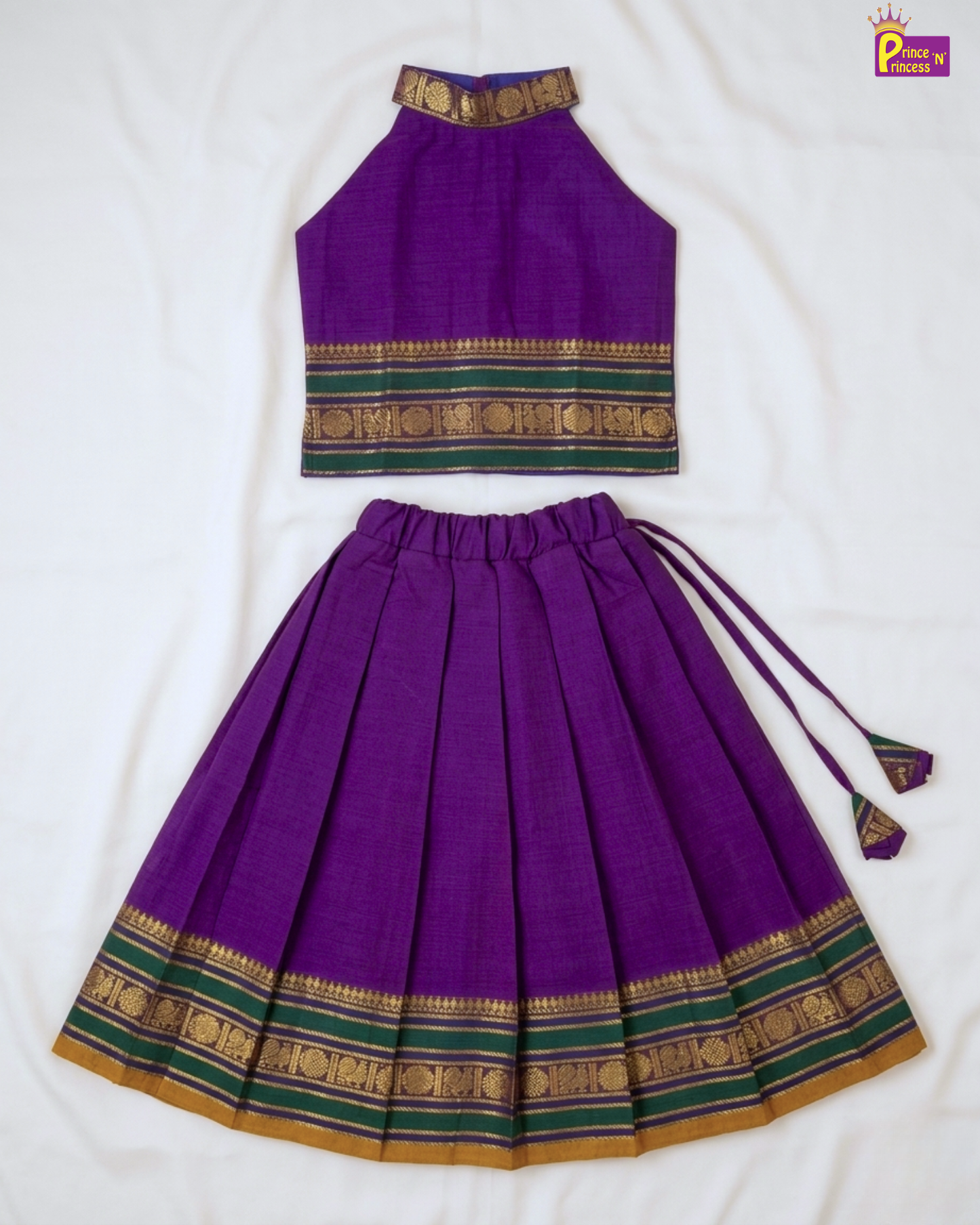 Purple traditional outfit with green and gold patterns on a white background