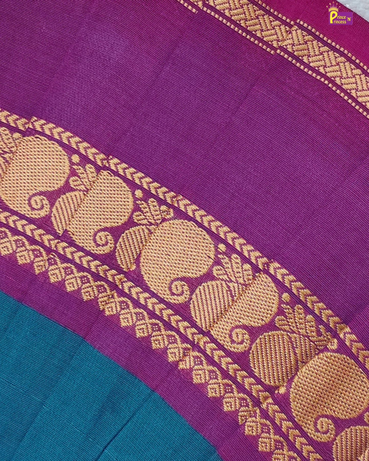 Purple and blue fabric with gold elephant design