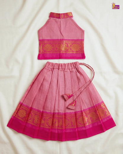 Pink traditional outfit with gold patterns on a white background