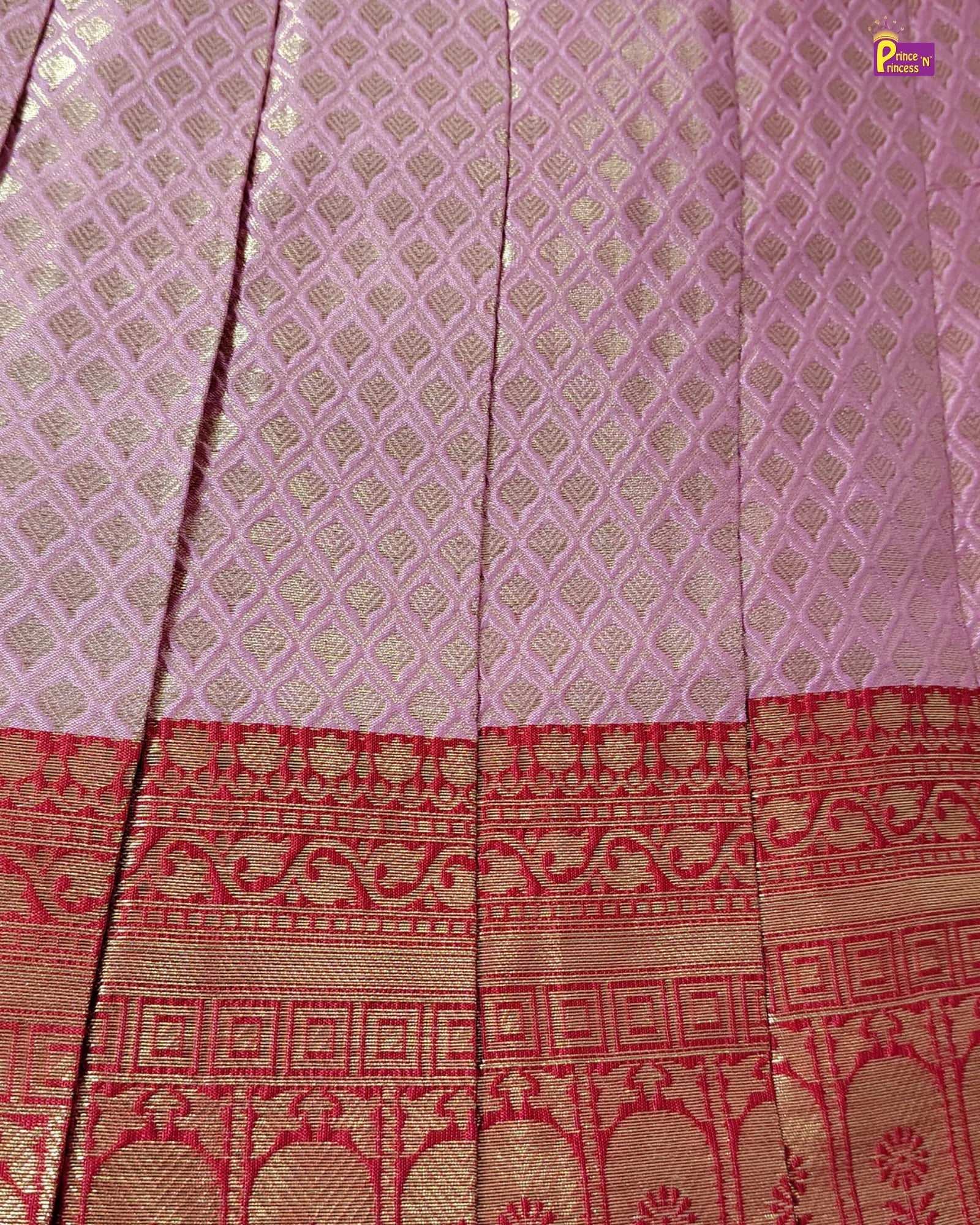 Purple fabric with gold and red patterns