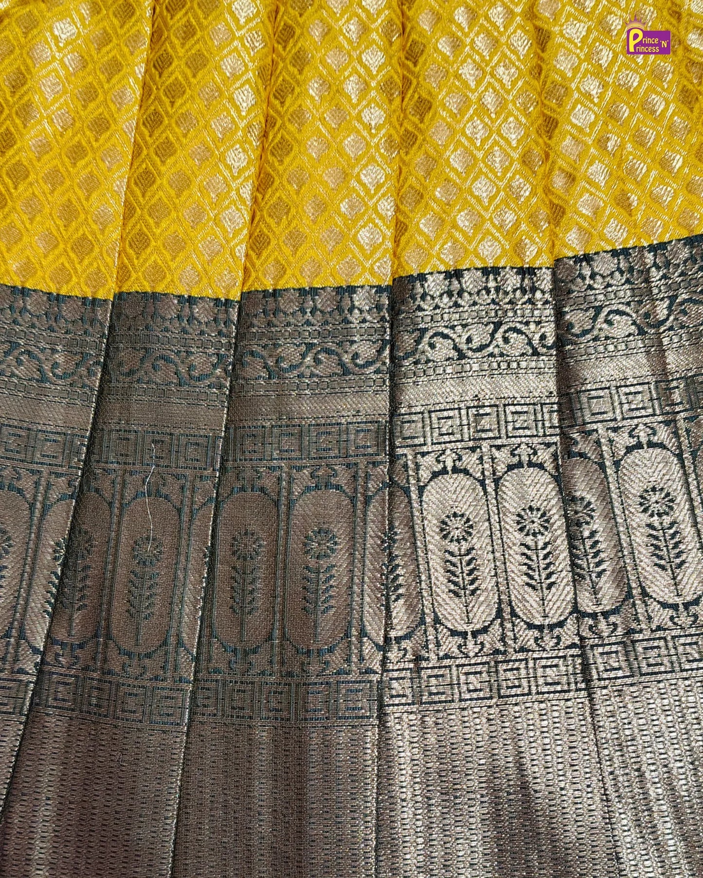 Saree with yellow and black patterned fabric