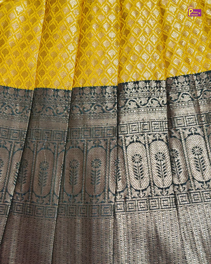 Saree with yellow and black patterned fabric