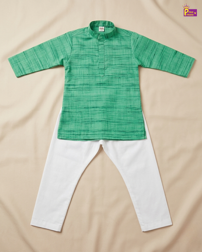 A two-piece children's outfit laid flat on a beige fabric background, featuring a green textured long-sleeve kurta with a mandarin collar and white pants.
