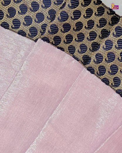 Fabric swatches including a patterned fabric and a plain pink fabric.