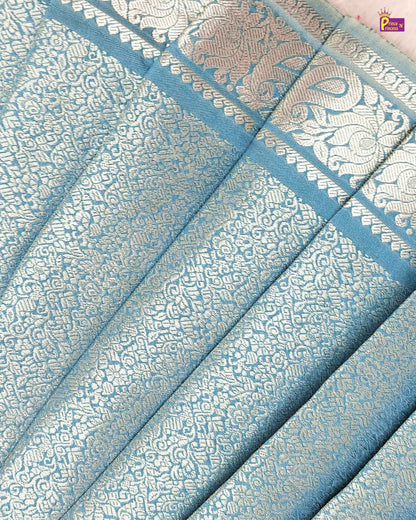 Blue and white patterned fabric with intricate designs