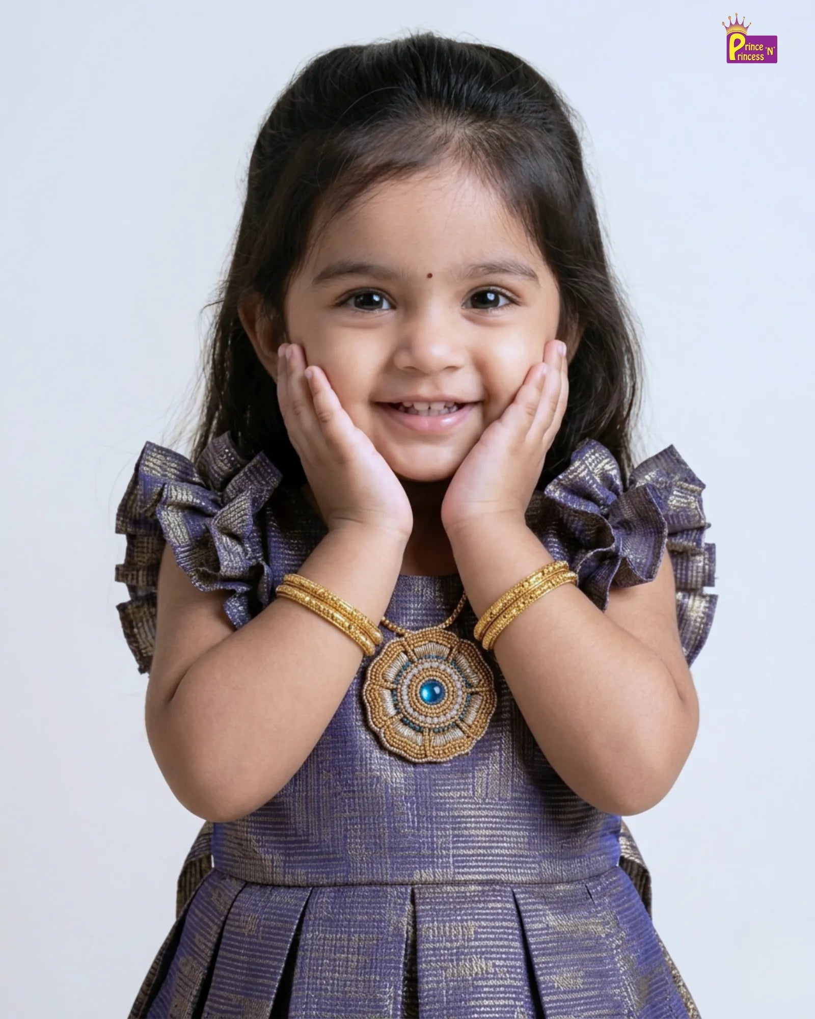 Young girl in a traditional outfit with decorative elements on a plain background