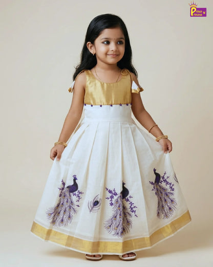 Young girl wearing a white dress with purple peacock designs on a beige background