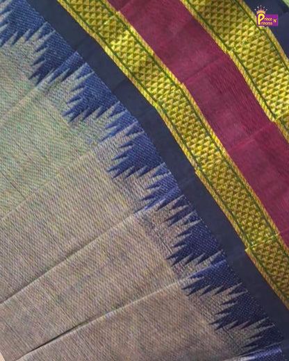Close-up of a woven textile with a beige body, a dark navy blue border with blue tassels, and a wide magenta and gold striped pallu.