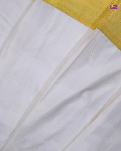 Close-up of white fabric with a yellow border
