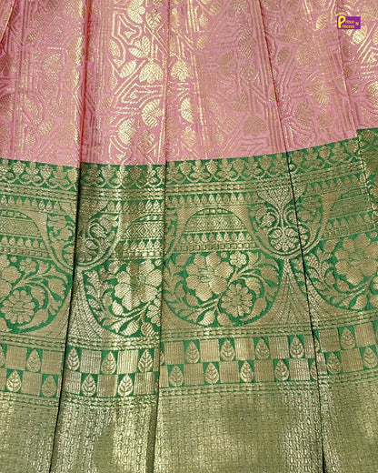 Traditional saree with pink and green patterns