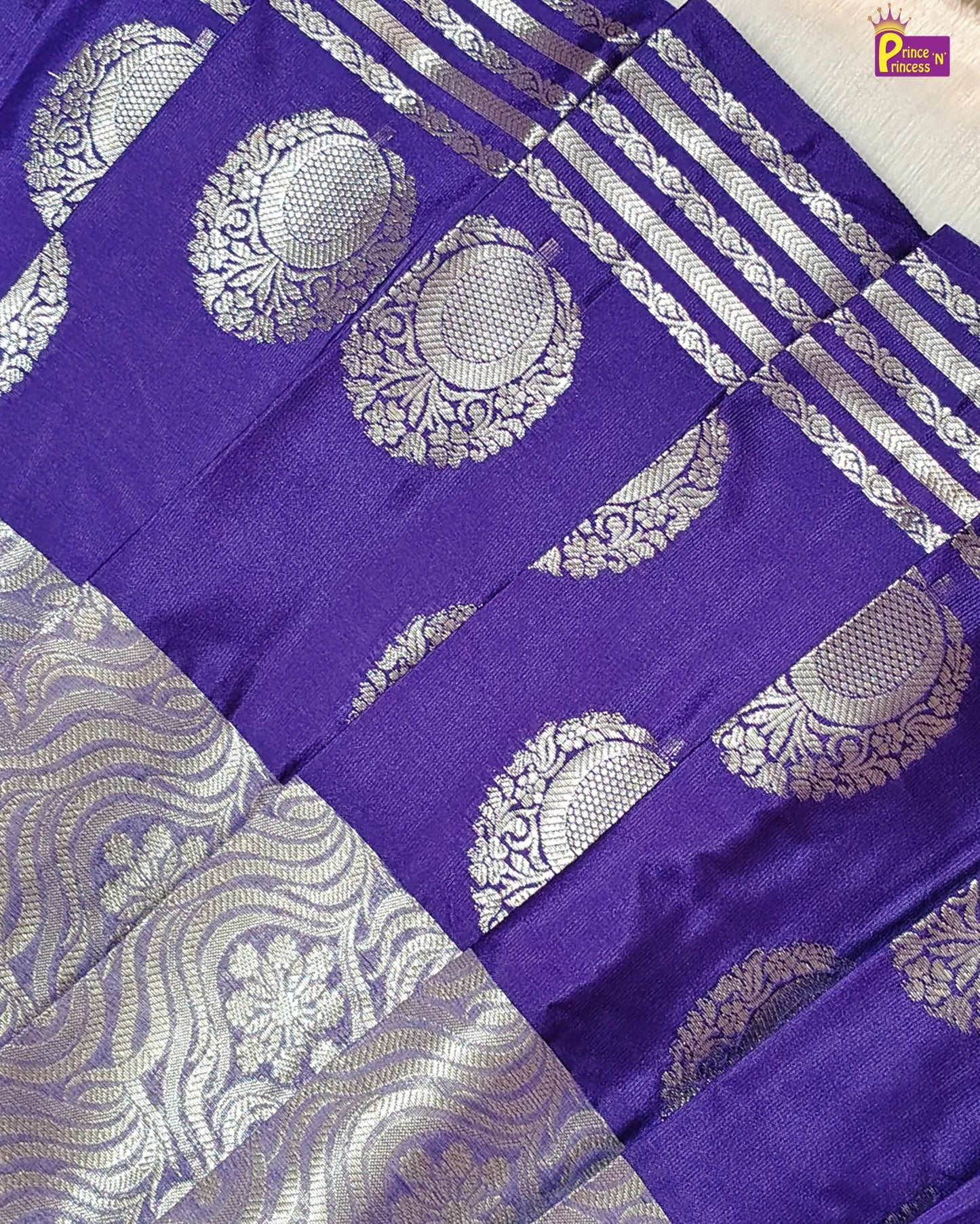 Purple saree with silver floral patterns